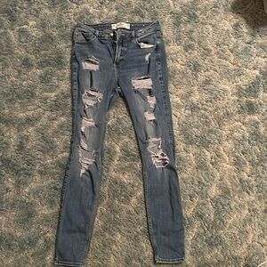 Hollister curvy high rise super skinny ripped jeans.